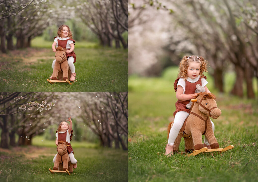 3 year old girl playing on a rocking horse during an outdoor spring family session
