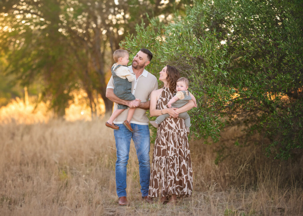 Family of 4 with 2 toddles during outdoor family photoshoot 