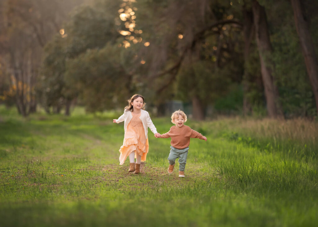 kids playing and laughing candid photography Melbourne park