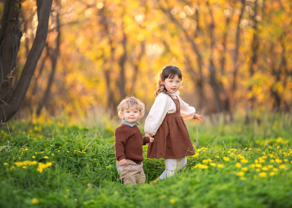 kids holding hands and walking during a Melbourne family photoshoot