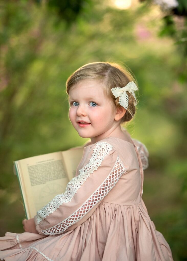 Young girl reading a book, Perth children's portraits in Swan Valley